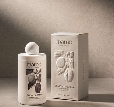 Lemon Dreams Conditioner fles naast de crèmekleurige verpakkingsdoos
