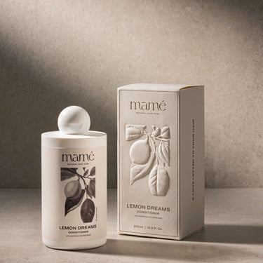 Lemon Dreams Conditioner fles naast de crèmekleurige verpakkingsdoos